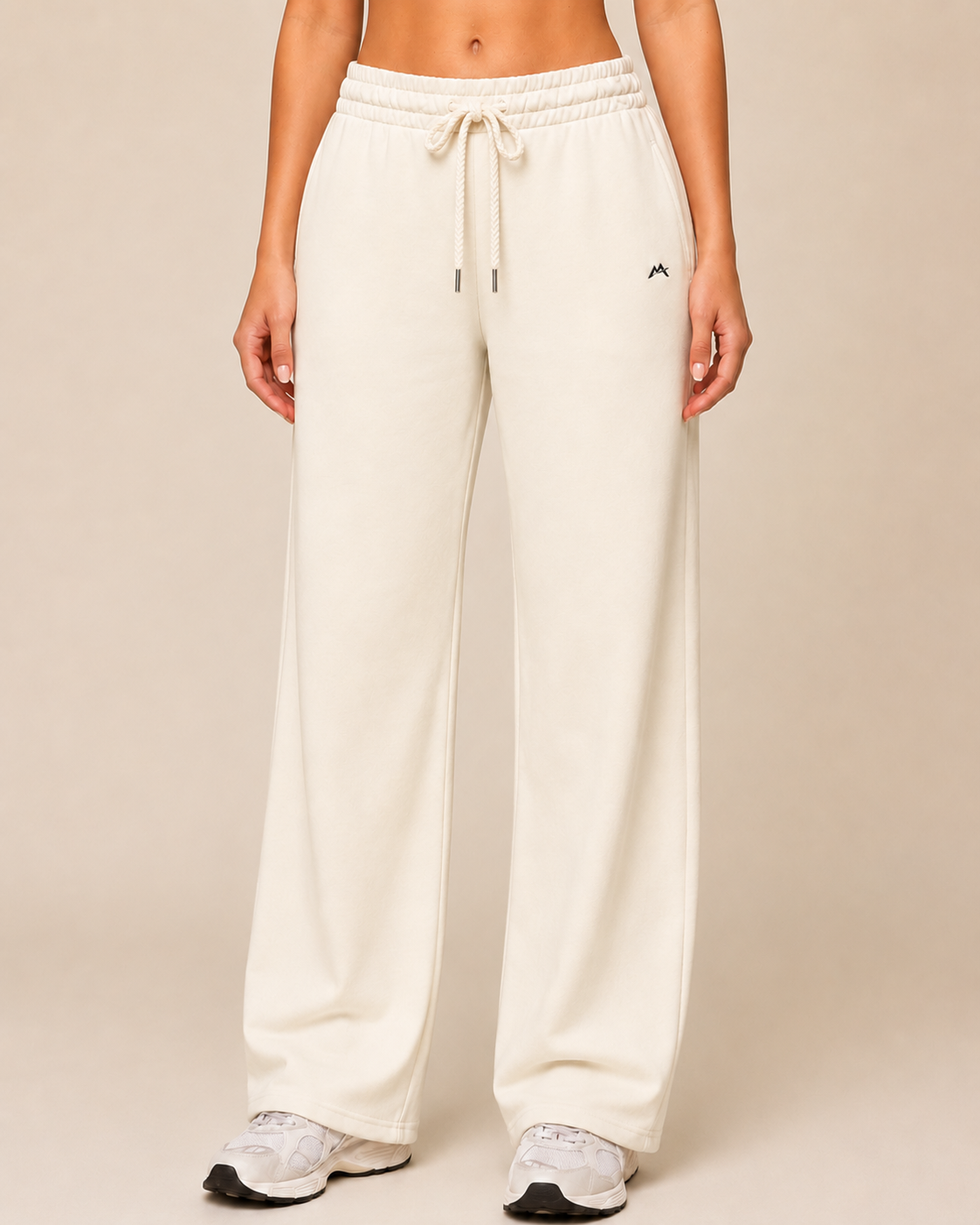 Unisex sweatpants from myattractivethings, soft fabric with an relaxed fit, shown in a neutral color on a plain background.