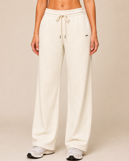 Unisex sweatpants from myattractivethings, soft fabric with an relaxed fit, shown in a neutral color on a plain background.