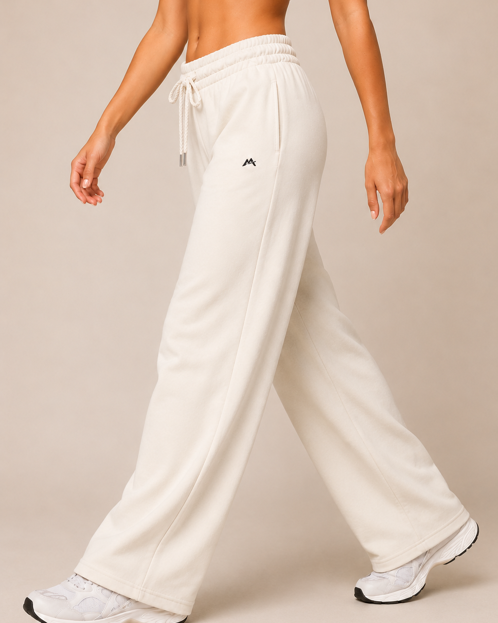 Unisex gray sweatpants from myattractivethings, featuring a relaxed fit and elastic waistband, shown on a person standing.