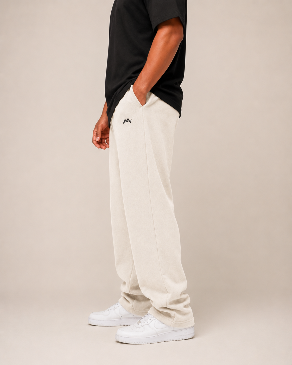 Unisex sweatpants by myattractivethings, soft fabric with a relaxed fit, shown laid flat with elastic waist and cuffs.