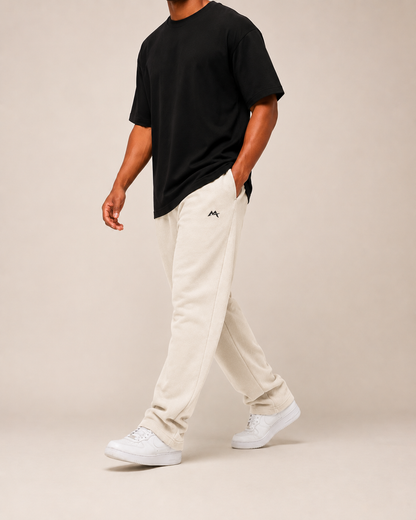 Unisex black sweatpants from myattractivethings with a relaxed fit and elastic waistband, ideal for casual wear.