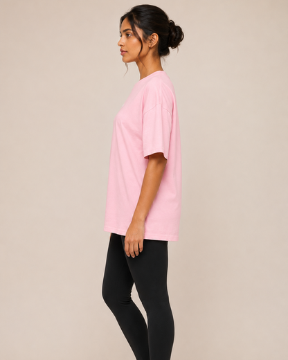 Unisex oversized terry cloth T-shirt in neutral color, relaxed fit, from myattractivethings, shown on a model.