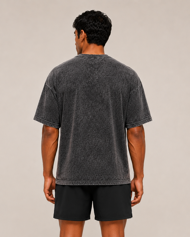 Black Apex Acid T-shirt by myattractivethings featuring a bold acid-inspired graphic design on the front.