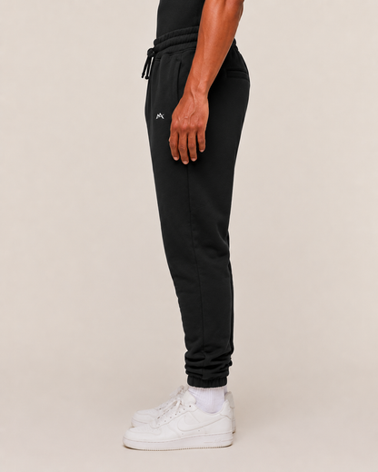Unisex black joggers from myattractivethings with a relaxed fit, elastic waistband, and tapered leg design.
