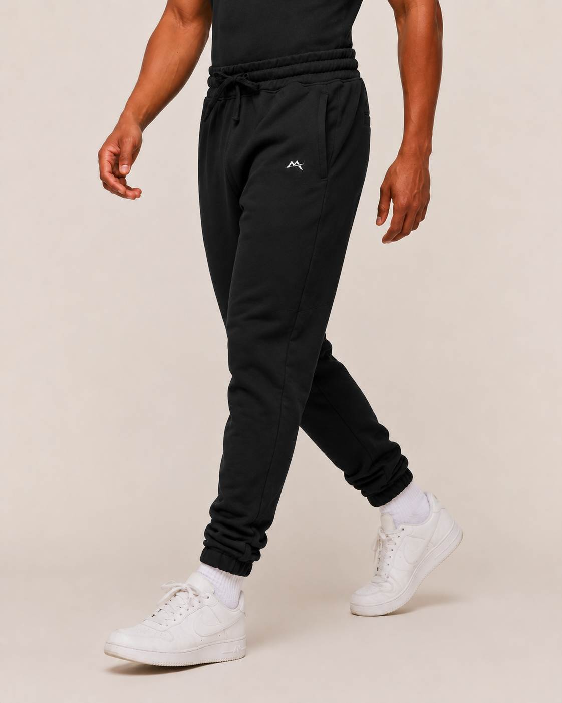 Unisex joggers by myattractivethings featuring a comfortable fit, casual style, and soft fabric in a neutral color.