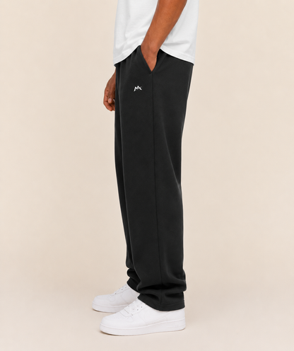 Unisex sweatpants from myattractivethings, soft fabric with a relaxed fit, shown laid flat with drawstring waist and cuffed ankles.