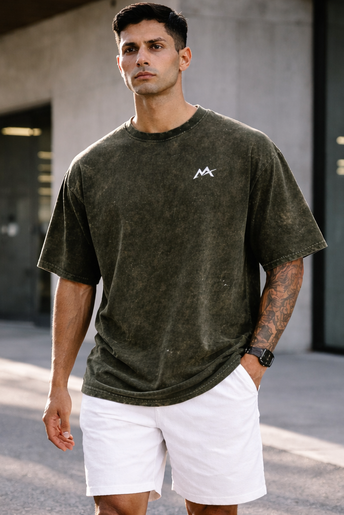 Myattractivethings Apex Acid Tee displayed on a model, featuring a vibrant graphic design and casual fit.